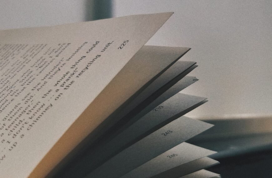 Close up picture of the pages of a book fluttered open.